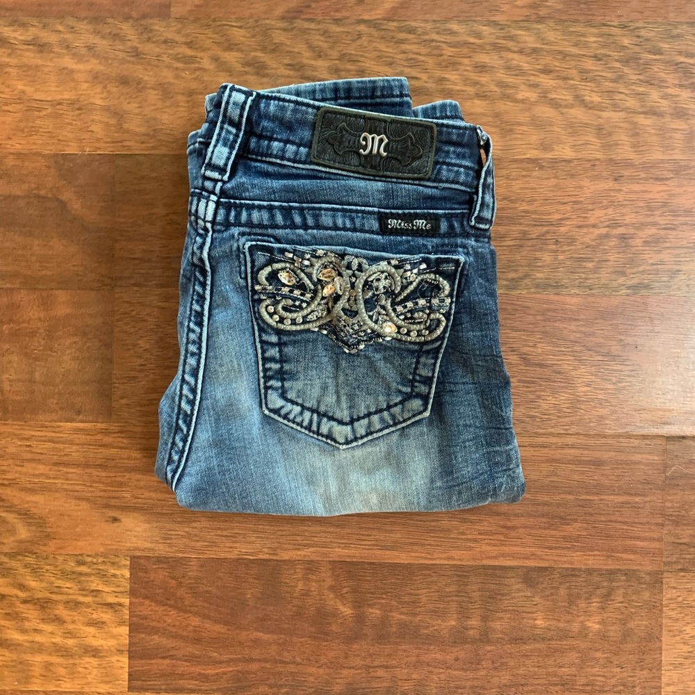 Boot cut Miss Me jeans.
